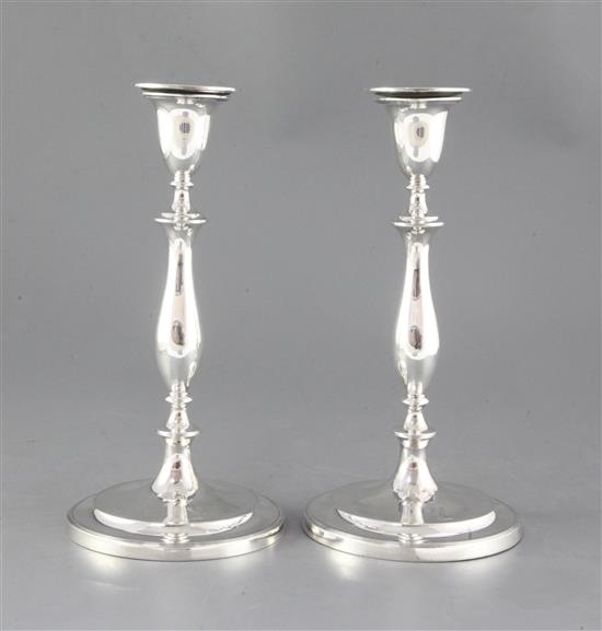 A pair of George III silver candlesticks, 28.5cm.